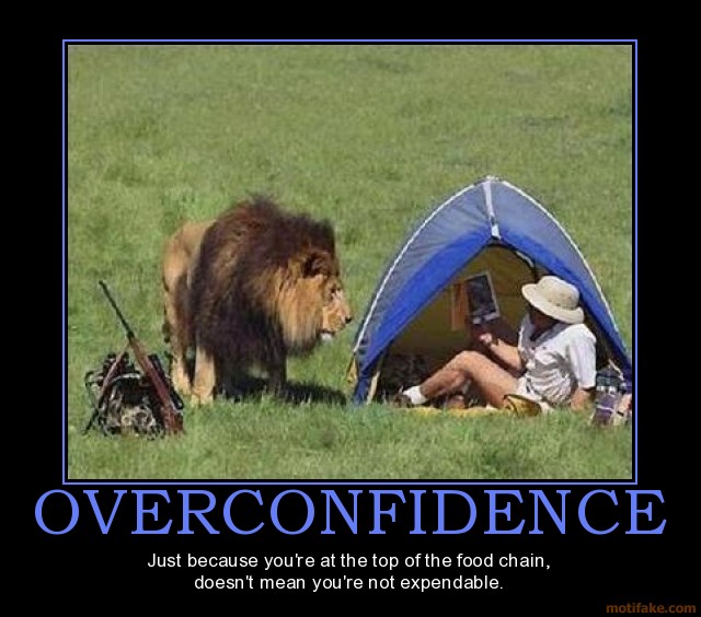 overconfidence-lion-food-chain-fail-demotivational-poster-1274377210.jpg